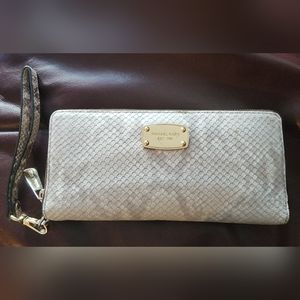 Michael Kors leather wristlet wallet.